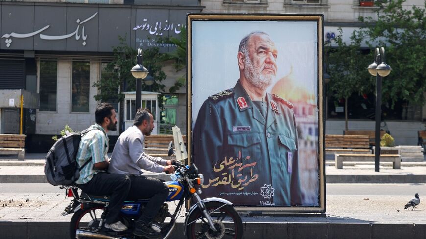 A poster of slain Iranian Revolutionary Guards commander Hossein Salami, killed by Israel, at a Tehran square