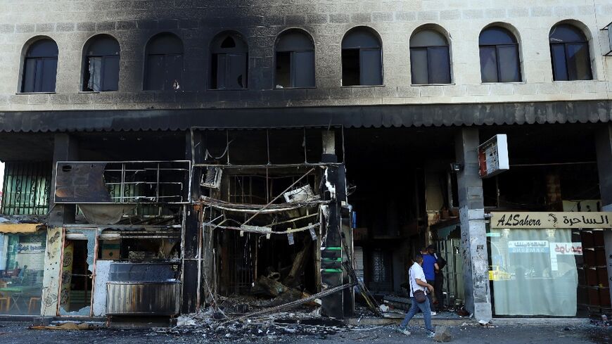 Government forces left behind widespread destruction as they withdrew from the southern Syrian city of Sweida, residents say
