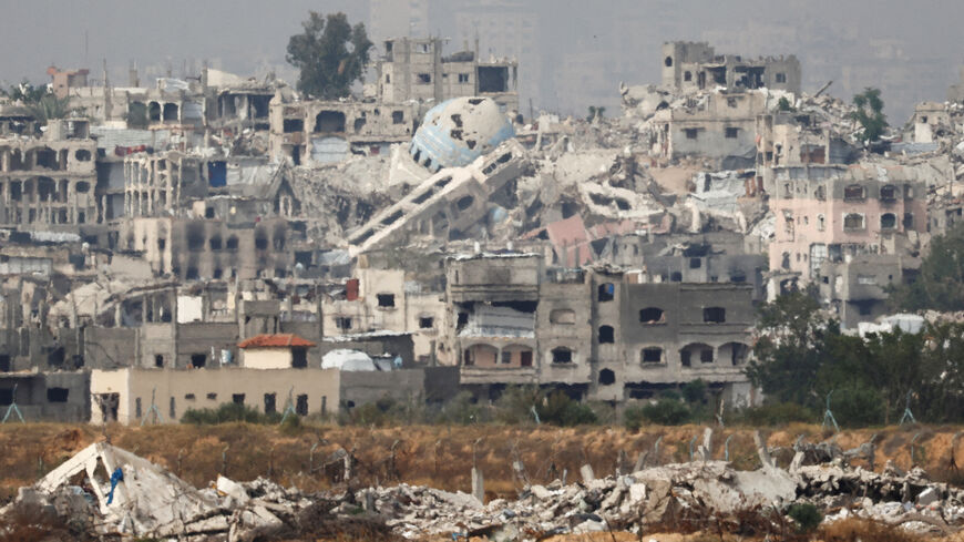 FILE PHOTO: A general view of destruction in North Gaza, as seen from the Israeli side of the Israel-Gaza border, May 17, 2025. REUTERS/Amir Cohen/File Photo
