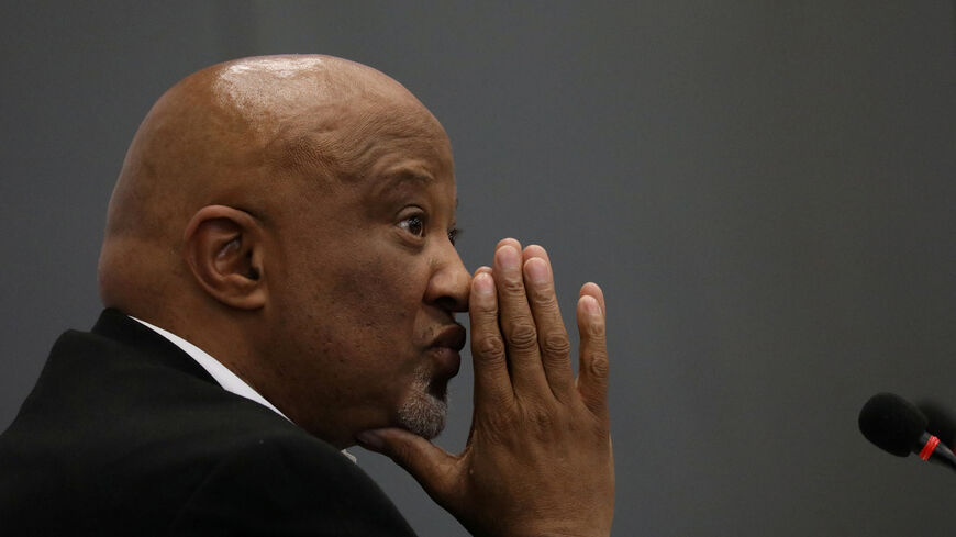 FILE PHOTO: Former Deputy Finance Minister Mcebisi Jonas gestures ahead of the Judicial Commission of Inquiry probing state capture in Johannesburg, South Africa August 24, 2018. REUTERS/Siphiwe Sibeko/File Photo