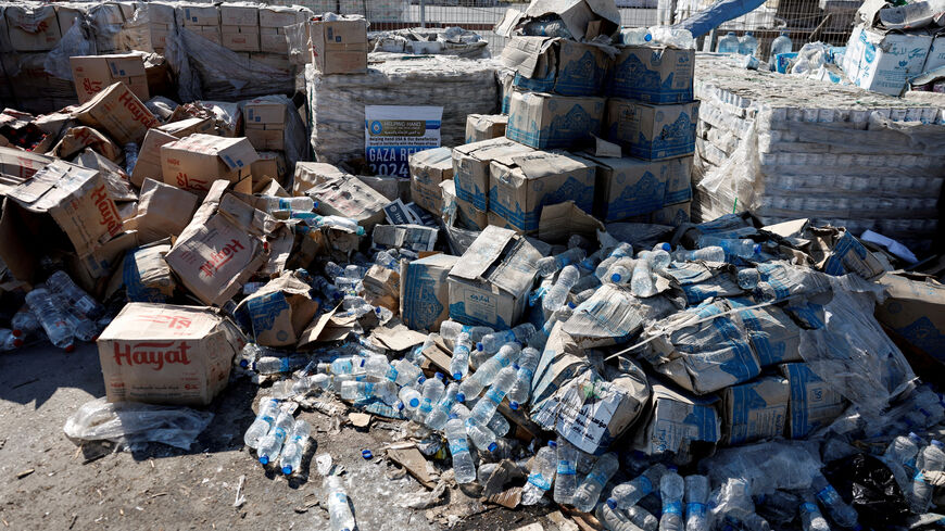 FILE PHOTO: Parcels of humanitarian aid await transfer into Gaza, at the Gaza side of the Kerem Shalom crossing in the Gaza Strip, July 24, 2025. REUTERS/Amir Cohen    EDITOR'S NOTE: REUTERS PHOTOGRAPHS WERE REVIEWED BY THE IDF AS PART OF THE CONDITIONS OF THE EMBED. NO PHOTOS WERE REMOVED./File Photo