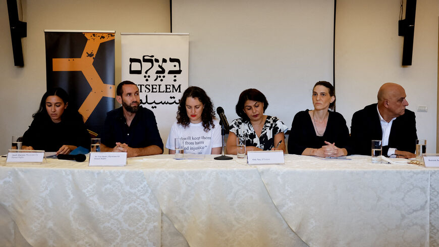 FILE PHOTO: Israeli human rights groups hold a press conference to issue a report saying Israel is committing a genocide in Gaza, in East Jerusalem, July 28, 2025. REUTERS/Ammar Awad/File Photo