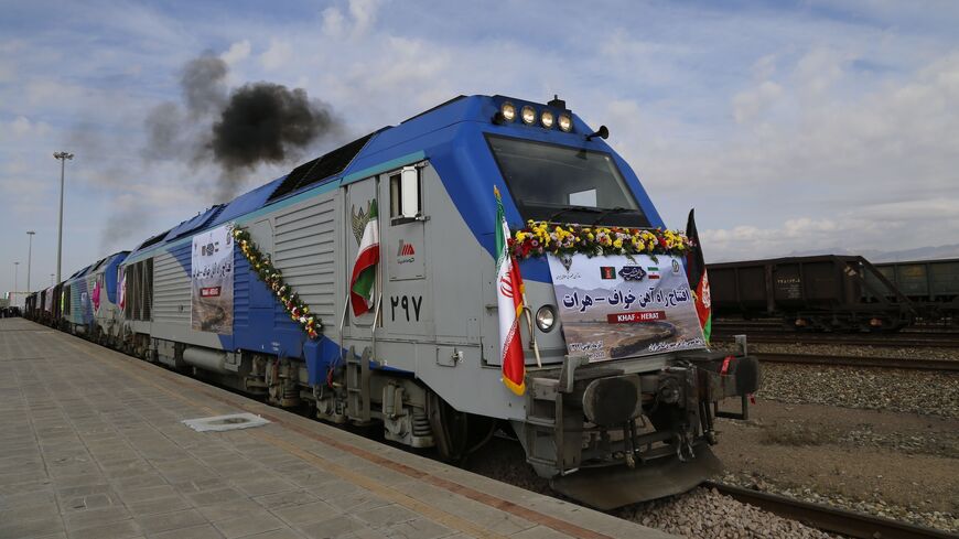 A train moves during the inauguration of a 140-kilometer line running from eastern Iran into western Afghanistan, at a railroad station in Khaf, on Dec. 10, 2020.