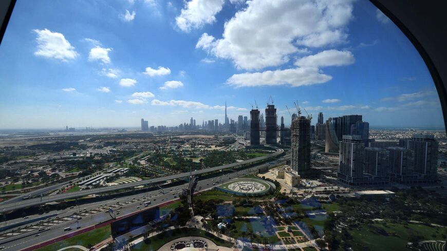This picture taken on on Feb. 1, 2021 shows a view of the downtown Dubai skyline, with Burj Khalifa, as seen from the Dubai Frame vantage point.