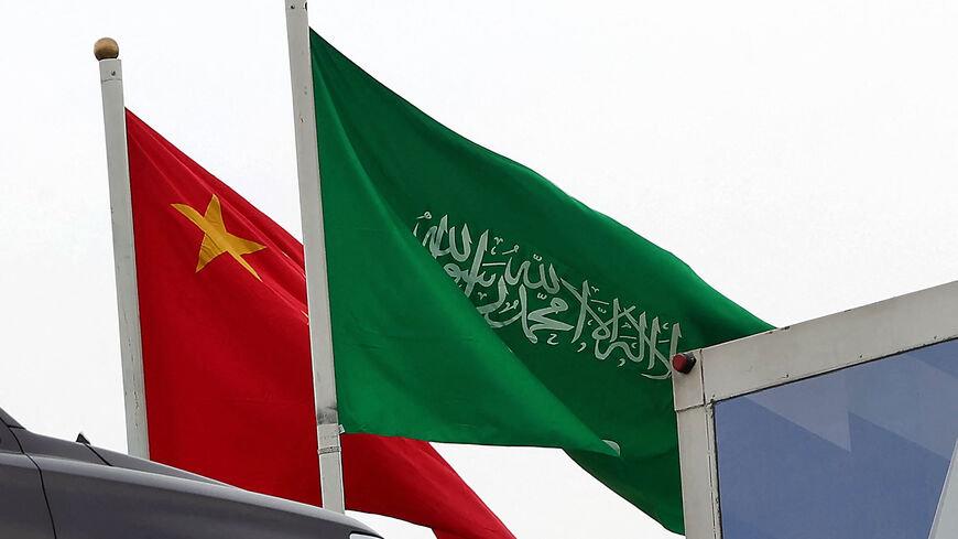 A picture taken on December 7, 2022 in Riyadh, shows the Chinese and the Saudi flags adorning a street ahead of the Chinese president's visit to the Saudi capital. - Chinese President Xi Jinping will make a three-day visit to Saudi Arabia this week, meeting the king and de facto ruler of the world's biggest oil exporter. (Photo by Fayez Nureldine / AFP) (Photo by FAYEZ NURELDINE/AFP via Getty Images)