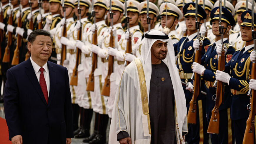 BEIJING, CHINA - MAY 30: Chinese President Xi Jinping and United Arab Emirates President Sheikh Mohammed bin Zayed Al Nahyan review the honour guard during a welcome ceremony at The Great Hall of People on May 30, 2024 in Beijing, China. (Photo by Tingshu Wang - Pool/Getty Images)
