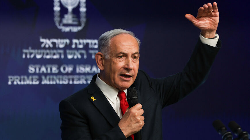TOPSHOT - Israeli Prime Minister Benjamin Netanyahu gives a press conference in Jerusalem on May 21, 2025. Netanyahu said on May 21 that he was ready for a "temporary ceasefire" to guarantee the return of hostages held in Gaza, of whom 20 are "certainly" alive. (Photo by Ronen Zvulun / POOL / AFP) (Photo by RONEN ZVULUN/POOL/AFP via Getty Images)
