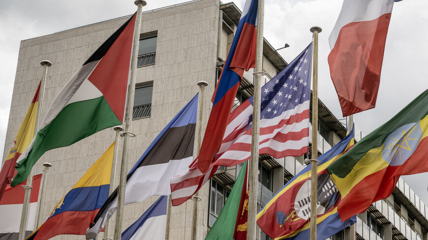 This photograph taken on July 23, 2025 shows a US flag flying in front of the United Nations Educational, Scientific and Cultural Organisation (UNESCO) headquarters in Paris. The United States said on July 22, 2025 it would quit UNESCO, saying the UN cultural and education agency, best known for establishing world heritage sites, is biased against Israel and promotes "divisive" causes. (Photo by Hugo MATHY / AFP) (Photo by HUGO MATHY/AFP via Getty Images)