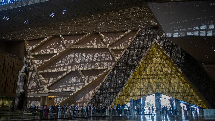 Visitors tour the Grand Egyptian Museum in Giza