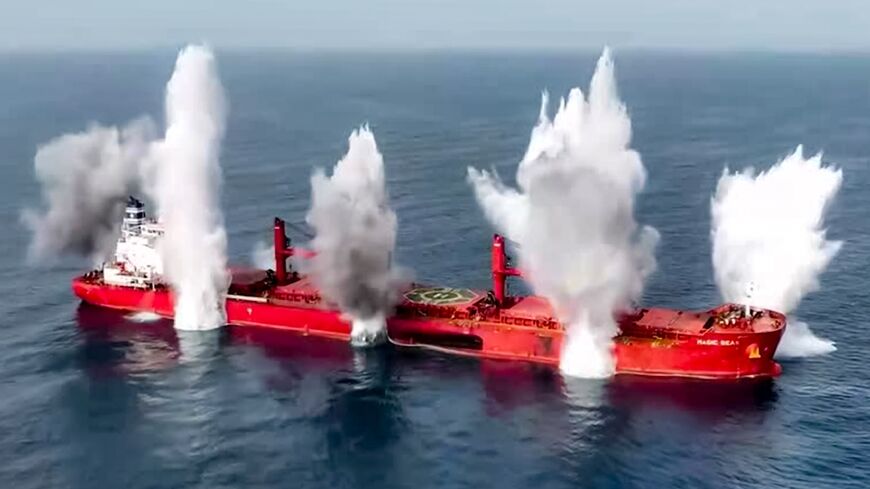 This picture released by Yemen's Huthi rebels shows explosives being detonated aboard the Liberian-flagged bulk carrier Magic Seas on Sunday during their first attack on Red Sea shipping this year.