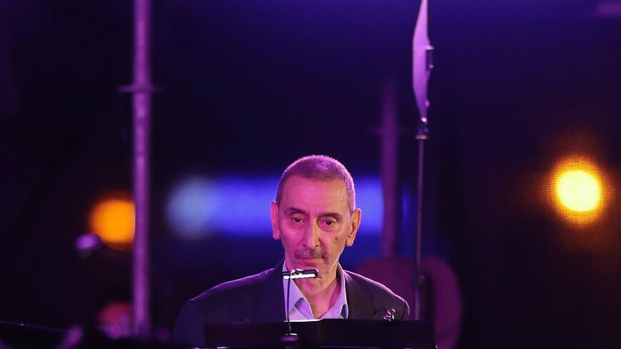 Lebanese pianist, composer and playwright Ziad Rahbani performs during the Beirut Holidays 2019 Festival at the waterfront in the Lebanese capital