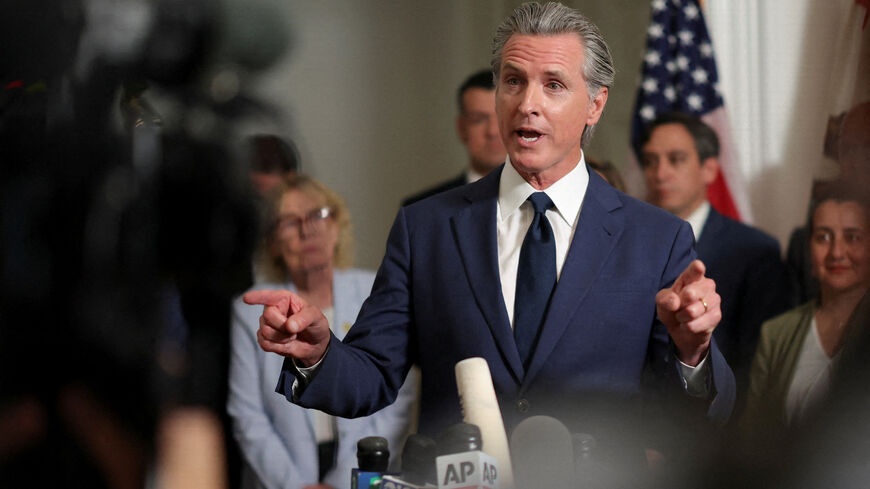 California Governor Gavin Newsom speaks at a press conference, accompanied by members of the Texas Democratic legislators, at the governor’s mansion in Sacramento, California, U.S., August 8, 2025. REUTERS/Carlos Barria