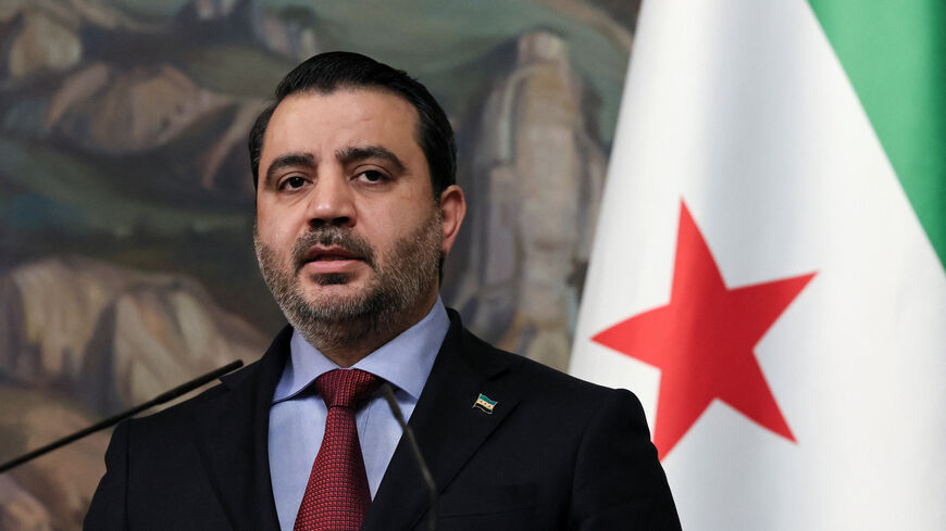 FILE PHOTO: Syrian Foreign Minister Asaad Hassan al-Shibani speaks during a press conference in Moscow, Russia, July 31, 2025. REUTERS/Shamil Zhumatov/Pool