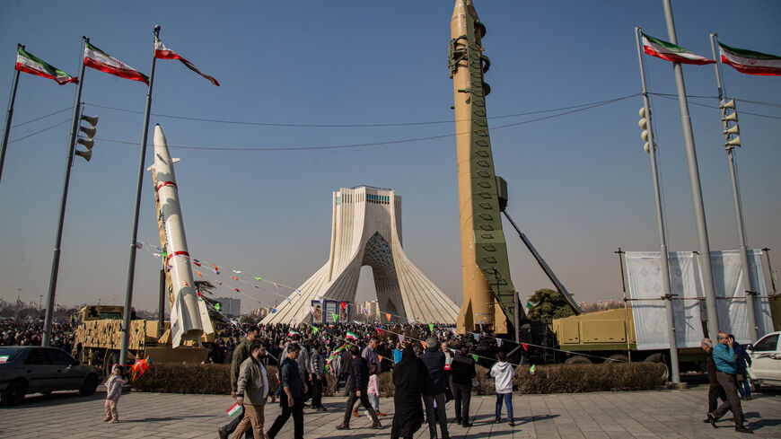 Missiles and UAV's are showed for the people on the side of the road in Tehran, Iran, on Feb. 11, 2024.