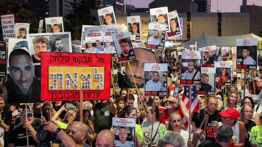 Demonstrators in Tel Aviv waved signs and held up pictures of hostages still being held in the Gaza Strip as they called on the government to secure their release