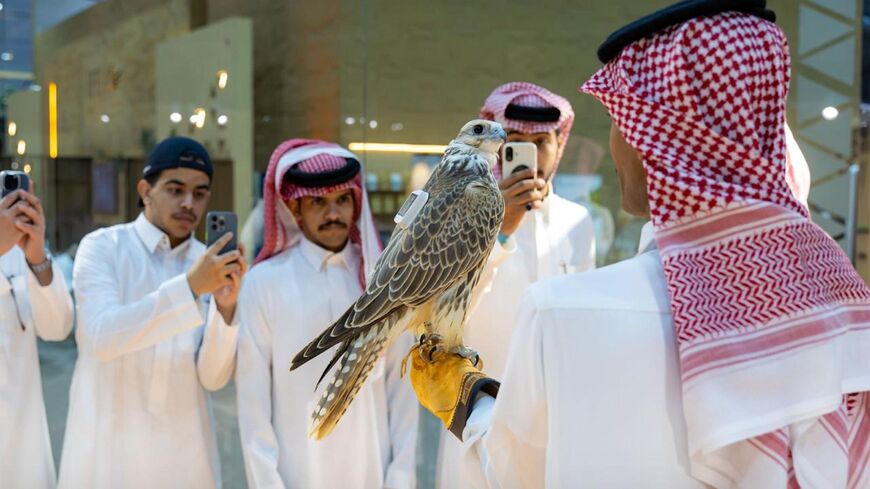 Visitors at the first night of the International Falcon Breeders Auction 2025 in Malham city on Aug. 5, 2025.