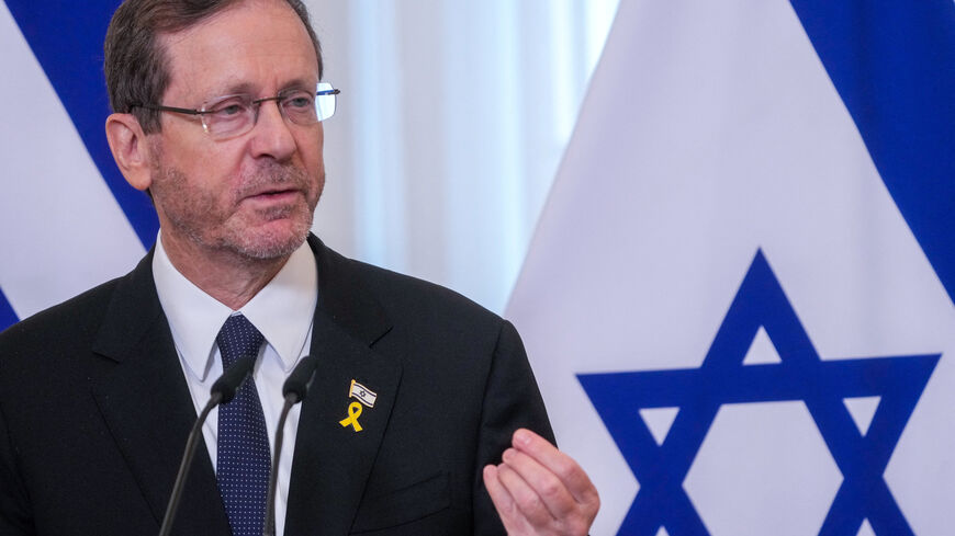 FILE PHOTO: Israeli President Isaac Herzog speaks during a press conference with Latvian President Edgars Rinkevics in Riga, Latvia August 5, 2025. REUTERS/Ints Kalnins/File Photo