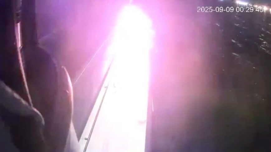 FILE PHOTO: A CCTV footage shows a glow from a fire that struck a vessel of the Global Sumud Flotilla (GSF) in the Tunisian waters off the coast of Tunisia, September 8, 2025, in this screengrab obtained from a handout video. Global Sumud Flotilla/Handout via REUTERS/ File Photo