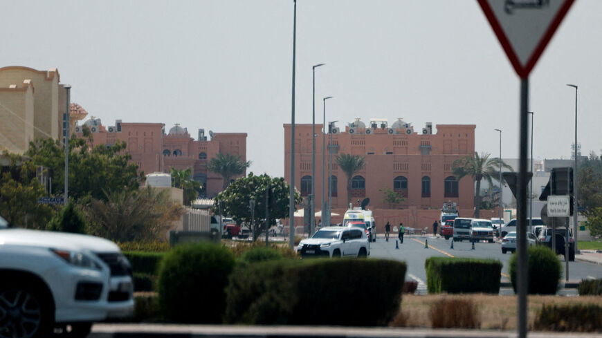 Vehicles are parked in the area of Tuesday's Israeli attack on Hamas leaders, in Doha, Qatar, September 10, 2025. REUTERS/Ibraheem Abu Mustafa