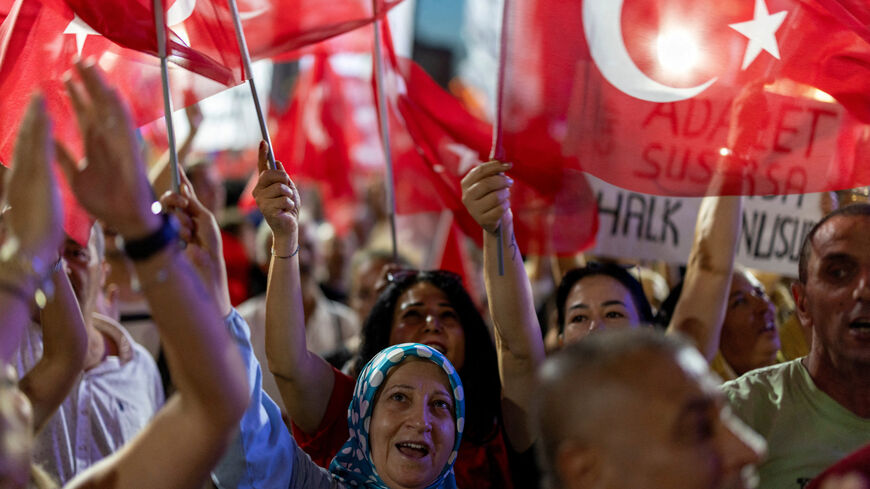 FILE PHOTO: Supporters of main opposition Republican People?s Party (CHP) attend a rally to protest against the arrest of Ekrem Imamoglu, the mayor of Istanbul and main rival of President Tayyip Erdogan, a day after the removal of the CHP's Istanbul provincial head Ozgur Celik by a court over alleged irregularities in a 2023 CHP provincial congress, in Istanbul, Turkey, September 3, 2025. REUTERS/Umit Bektas/File Photo