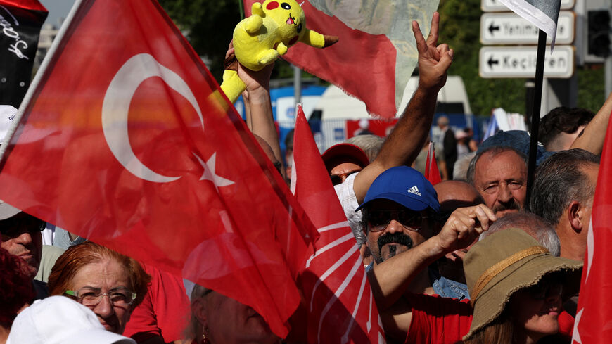 Supporters of main opposition Republican People's Party (CHP) attend a rally, a day before a court is set to rule on whether to annul the party's last general congress and unseat its leader, in Ankara, Turkey, September 14, 2025. REUTERS/Umit Bektas