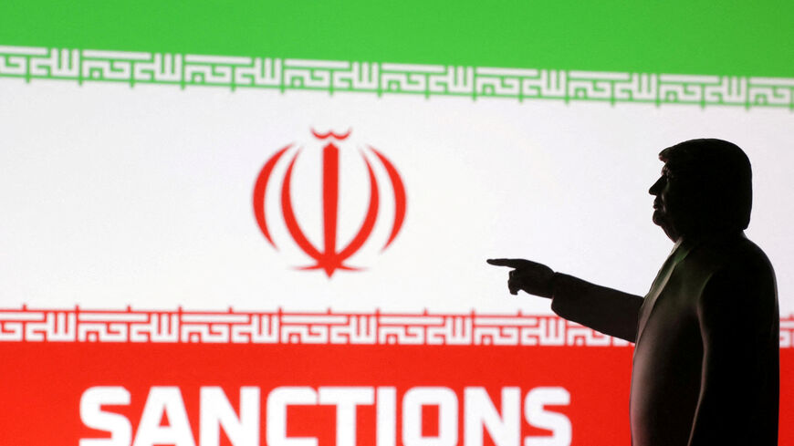 FILE PHOTO: A 3D-printed miniature model depicting U.S. President Donald Trump, Iran flag and word "Sanctions" in this illustration taken,  April 17, 2025. REUTERS/Dado Ruvic/Illustration/File Photo