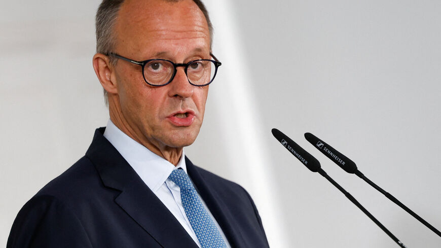German Chancellor Friedrich Merz speaks next to Spanish Prime Minister Pedro Sanchez (not pictured) during a joint press conference in Madrid, Spain, September 18, 2025. REUTERS/Susana Vera