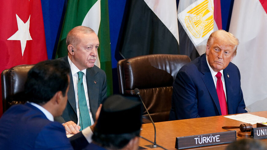 FILE PHOTO: U.S. President Donald Trump and Turkey's President Tayyip Erdogan attend a multilateral meeting during the 80th United Nations General Assembly, in New York City, New York, U.S., September 23, 2025. REUTERS/Al Drago/ File Photo