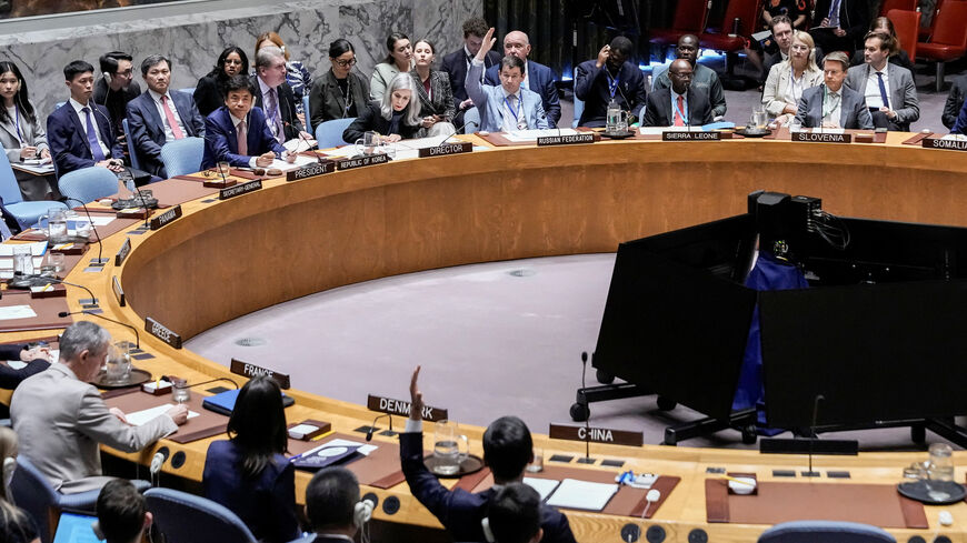 FILE PHOTO: Members of the United Nations Security Council vote on a resolution by Russia and China to delay by six months the reimposition of sanctions on Iran during the 80th U.N. General Assembly in New York City, U.S., September 26, 2025. REUTERS/Eduardo Munoz/File Photo