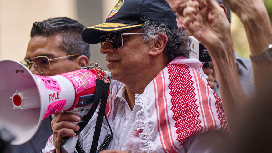 Colombian President Gustavo Petro addresses pro-Palestinian demonstrators at Dag Hammarskjold Plaza outside U.N. headquarters during the 80th United Nations General Assembly in New York City, U.S., September 26, 2025. REUTERS/Bing Guan