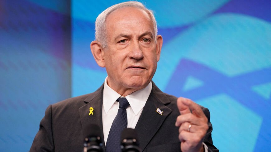 FILE PHOTO: Israeli Prime Minister Benjamin Netanyahu gestures during a joint press conference with U.S. Secretary of State Marco Rubio (not pictured) at the Prime Minister's Office, during Rubio's visit, in Jerusalem, September 15, 2025. REUTERS/Nathan Howard/Pool/File Photo