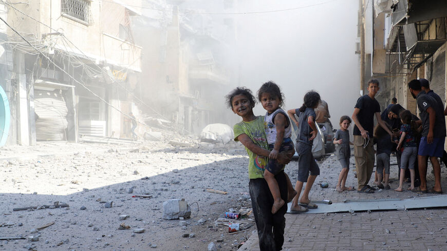 Palestinians children react, at the site of Israeli strikes on a house, in Gaza City, September 26, 2025. REUTERS/Ebrahim Hajjaj     TPX IMAGES OF THE DAY