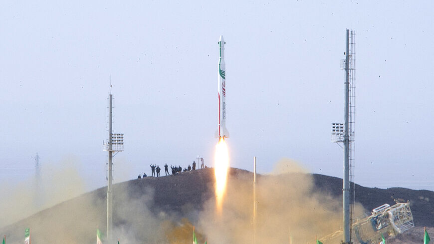 A picture obtained on Dec. 14, 2013 from Iran's ISNA news agency allegedly shows the launch of the Pajohesh (research) rocket containing a live space monkey named Fargam (Auspicious) at an undisclosed location in Iran.