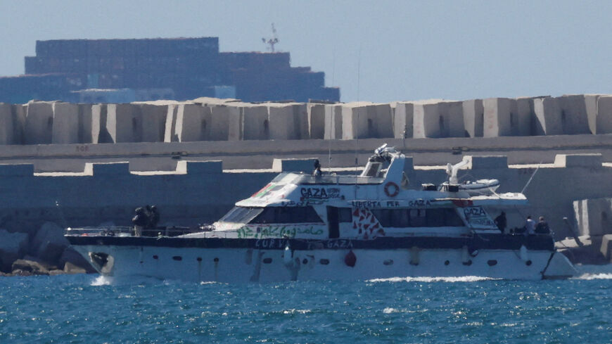 An intercepted vessel from the Global Sumud Flotilla moves towards Ashdod Port, after Israel intercepted some of the vessels of the Flotilla aiming to reach Gaza and break Israel's naval blockade, in southern Israel, October 2, 2025. REUTERS/Ammar Awad