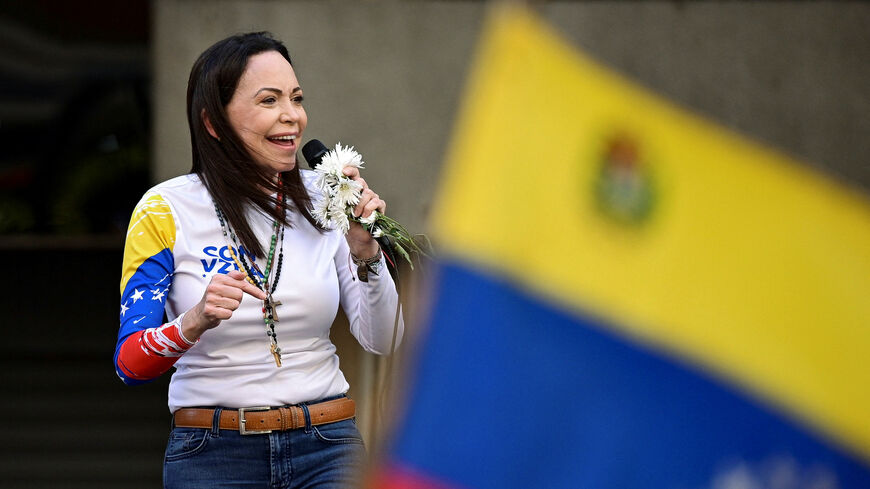 Venezuelan opposition leader Maria Corina Machado addresses supporters at a protest ahead of the Friday inauguration of President Nicolas Maduro for his third term, in Caracas, Venezuela January 9, 2025. REUTERS/Gaby Oraa