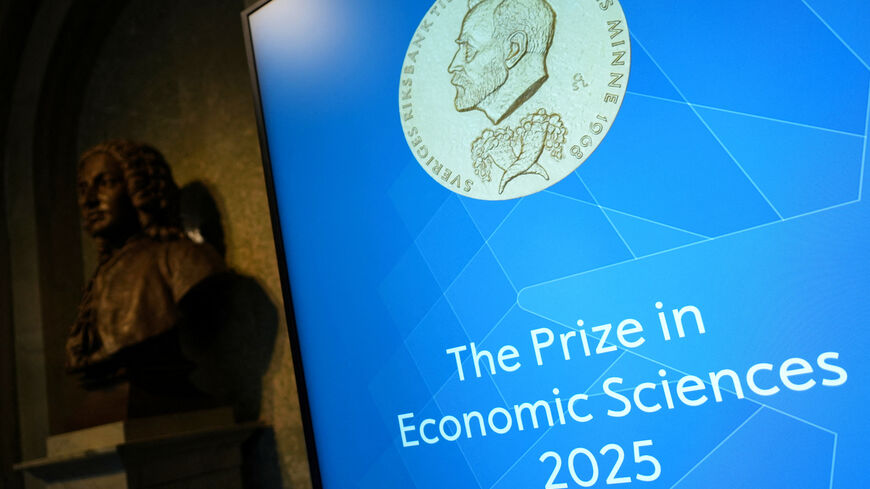 A screen displays an image of Nobel Prize medal, ahead of the announcement of the Nobel Prize in Economic Sciences at the Royal Swedish Academy of Sciences, in Stockholm, Sweden October 13, 2025. REUTERS/Tom Little
