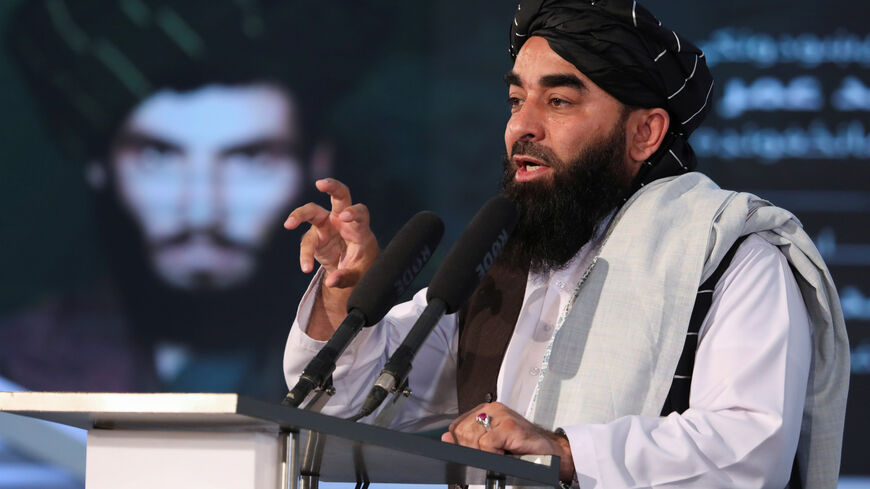 Afghan Taliban's Deputy Minister of Information and Culture and spokesman Zabihullah Mujahid speaks during the death anniversary of Mullah Mohammad Omar, the late leader and founder of the Taliban, in Kabul, Afghanistan, April 24, 2022. REUTERS/Ali Khara