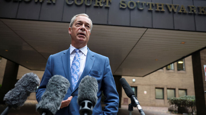 Nigel Farage, leader of Britain's Reform UK party, speaks following the sentencing of Fayaz Khan, who has been jailed for five years after he was found guilty of making a threat to kill Farage, at Southwark Crown Court in London, Britain, October 14, 2025. REUTERS/Hiba Kola