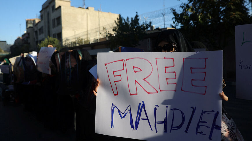 A group of students attend a gathering in support of an Iranian student prisoner in France, Mahdieh Esfandiari, in front of the French embassy in Tehran, Iran, October 21, 2025. Majid Asgaripour/WANA (West Asia News Agency) via REUTERS   ATTENTION EDITORS - THIS PICTURE WAS PROVIDED BY A THIRD PARTY
