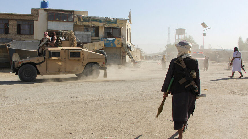Afghan Taliban fighters patrol near the Afghanistan-Pakistan border in Spin Boldak, Kandahar Province, following exchanges of fire between Pakistani and Afghan forces in Afghanistan, October 15, 2025. REUTERS/Stringer