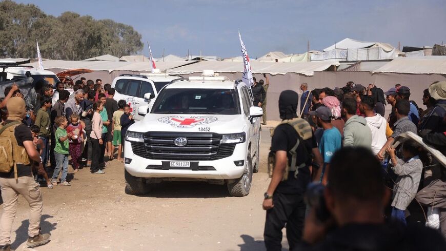 Militants have handed over 20 living hostages