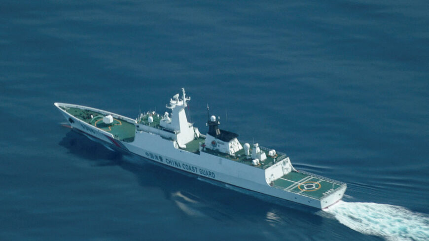 FILE PHOTO: An aerial view of a China Coast Guard ship navigating near the disputed Scarborough Shoal in the South China Sea, August 13, 2025. REUTERS/Adrian Portugal/File Photo