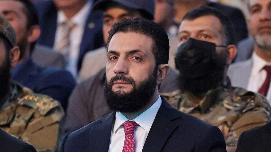 FILE PHOTO: Syria?s interim President Ahmed al-Sharaa looks on as he attends the ?Aleppo, Key to Victory? celebration marking Syria?s liberation, in Aleppo, Syria May 27, 2025. REUTERS/Khalil Ashawi/File Photo