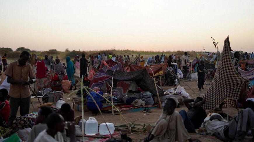 A general view of people sitting at a camp for displaced families who fled from al-Fashir to Tawila, North Darfur, Sudan, October 27, 2025. REUTERS/Mohammed Jamal
