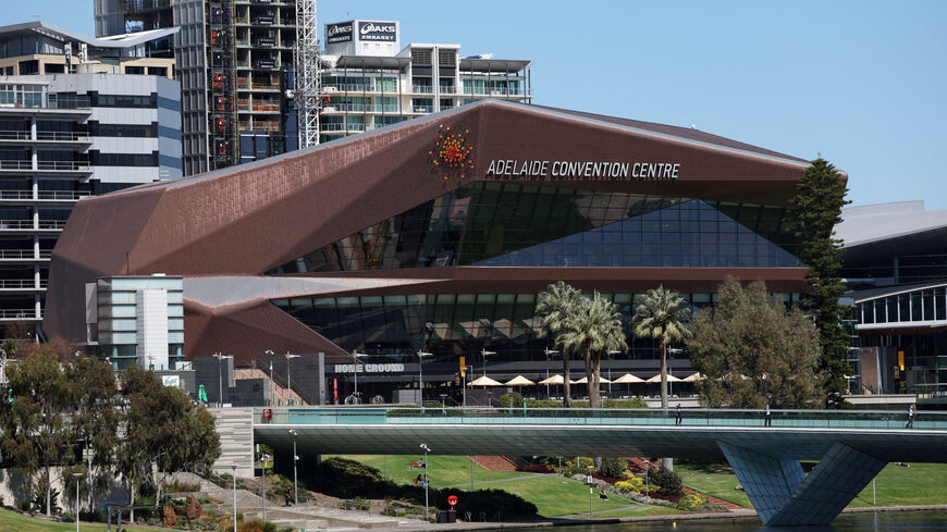 FILE PHOTO: The Adelaide Convention Centre, proposed as the primary venue for Australia’s bid to host the COP31 climate change conference, overlooks the River Torrens in Adelaide, Australia, September 18, 2025. REUTERS/Hollie Adams./File Photo
