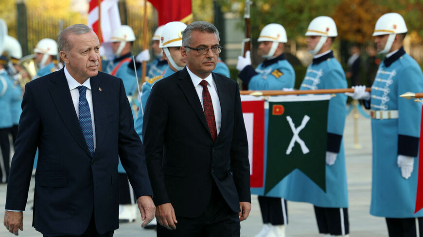Turkey's President Tayyip Erdogan and Turkish Cypriot leader Tufan Erhurman attend a welcoming ceremony at the Presidential Palace in Ankara, Turkey, November 13, 2025. Murat Cetinmuhurdar/PPO/Handout via REUTERS