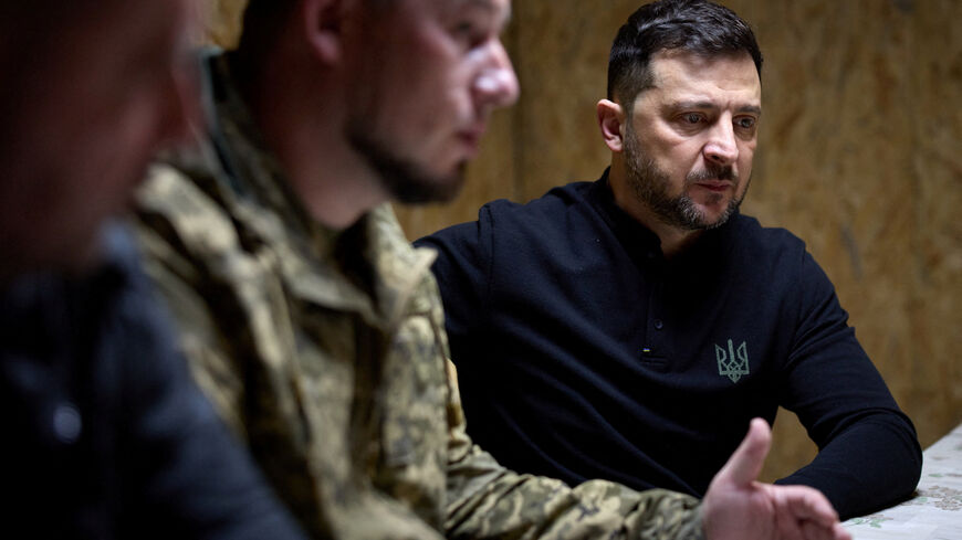 Ukraine's President Volodymyr Zelenskiy attends a meeting with senior officers of the 65th Separate Mechanized Brigade 'Velykyi Luh' while he visits their command position at a front line, amid Russia's attack on Ukraine, in Zaporizhzhia region, Ukraine November 13, 2025. Ukrainian Presidential Press Service/Handout via REUTERS