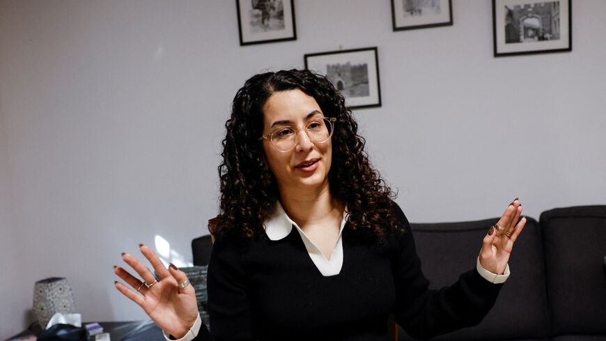 Milena Ansari, a Human Rights Watch researcher, gestures during an interview with Reuters in Beit Hanina, East Jerusalem November 19, 2025. REUTERS/Ammar Awad