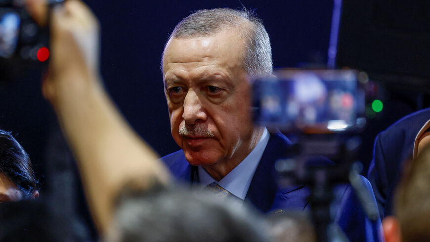 Turkey's President Tayyip Erdogan walks after speaking to the media, at the end of the G20 Leaders' Summit in Johannesburg, South Africa, November 23, 2025. REUTERS/Thomas Mukoya