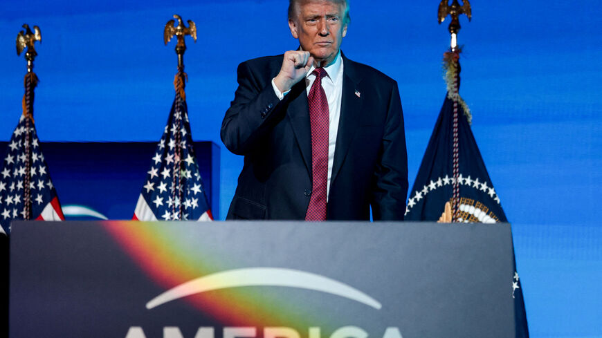 FILE PHOTO: U.S. President Donald Trump gestures during the American Business Forum Miami at the Kaseya Center Arena in Miami, Florida, U.S. November 5, 2025. REUTERS/Jonathan Ernst/File Photo